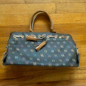 Dooney and Bourke Logo Leather Bag with Tassels and Heart Charm